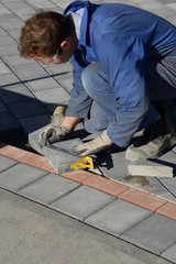 laying the paving stones