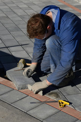 laying the paving stones