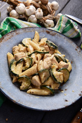 Penne pasta witch chicken and zucchini in cheese sauce