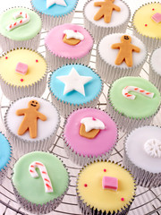 FAIRY CAKES OR CUPCAKES ON COOLING RACK