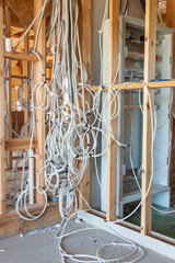 New electric installation at wooden house.