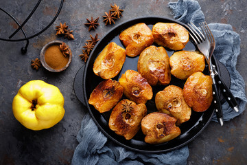 Apple quince baked with honey and cinnamon. Healthy vegetarian dessert