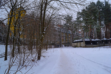 View of different buildings in winter in the city.