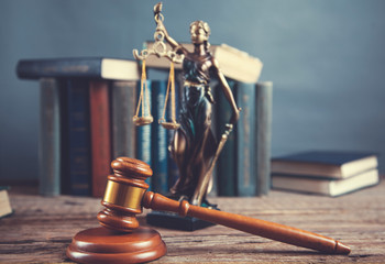 judge with  book and lady justic