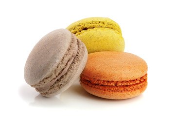 three macaroons isolated on white background closeup