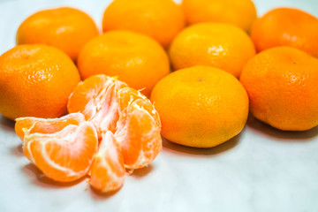 A bunch of mandarins on the table. Purified Mandarin.
