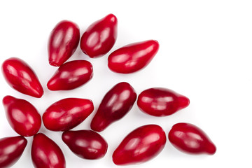 Red berries of cornel or dogwood isolated on white background with copy space for your text. Top view. Flat lay