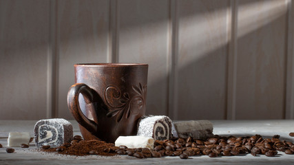 Cup of coffee and sweets Turkish delight on white table