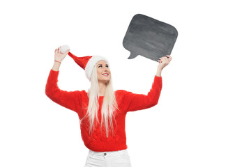 Christmas sign woman peeking over empty black chalkboard card sign wearing santa hat isolated on...
