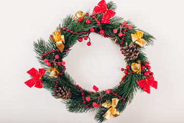 Fototapeta na wymiar Christmas wreath with decoration on white background. Christmas and New Year background