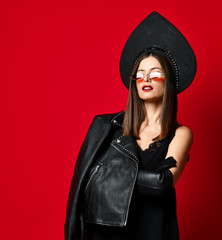 Brunette woman with mustaches in new brown modern fashion sunglasses