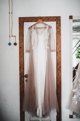 Luxurious light dress of the bride.