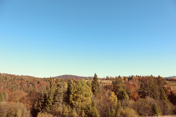 Picturesque landscape with blue sky over mountains