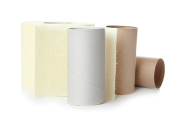 Full and empty toilet paper rolls on white background