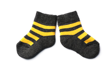Cute child socks on white background, top view