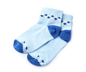 Cute child socks on white background, top view