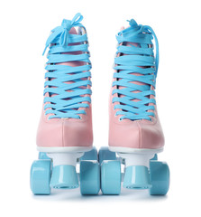 Pair of stylish quad roller skates on white background