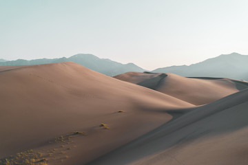 Fototapeta na wymiar Sand Dunes against the Sangre de Cristo Mountains