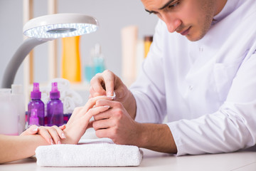 Hands during manicure care session