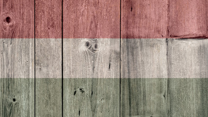 Hungary Politics News Concept: Hungarian Flag Wooden Fence