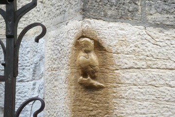 Dijon,France-October 14, 2018: Magic Owl of Dijon carved in relief on north wall of Eglise Notre-Dame de Dijon or Church of Notre-Dame in Dijon, France
