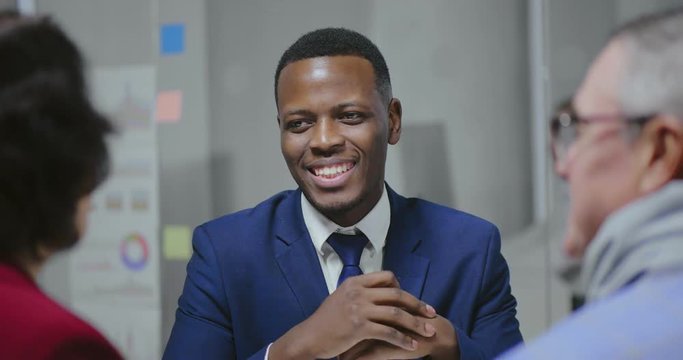 Smiling african american travel agent