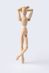 relax wooden mannequin isolated on white background
