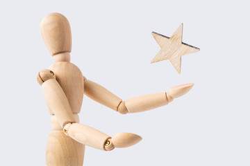 wooden mannequin with surreal wood star