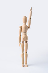wooden mannequin rise hand isolated on white background