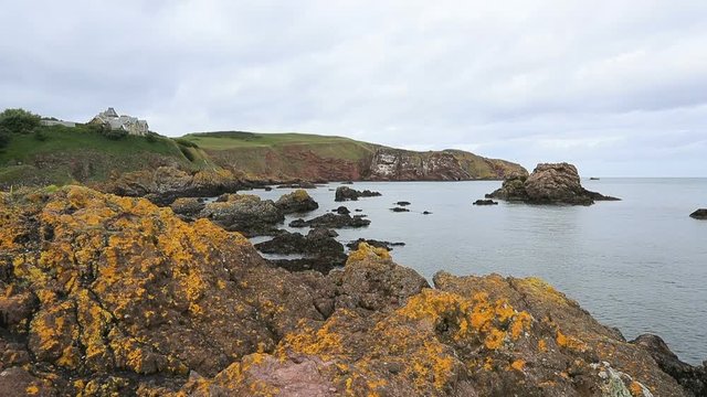 St Abbs Scotland Rocky Ocean Coastline. St Abbs A Small Fishing Village On The Southeastern Coast Of Scotland. Marina Harbor, Docks And Boat Mooring. Business, Trawler, Sailboats And Pleasure Boats.