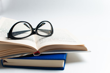 Notebook with glasses and pen, Book with glasses, Blue notebook with glasses, Book with cup of tea