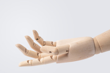 wooden hand with give posture isolated on white