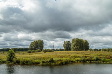 View of the bell tower in the Russian city of Shuya from the side of the river