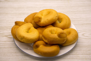 Aerial view of hands picking donuts fat,