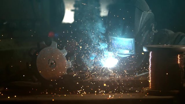Super slowmotion footage of welding person, 1000fps at 4K