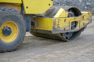 Road construction works with roller compactor machine and asphalt finisher .