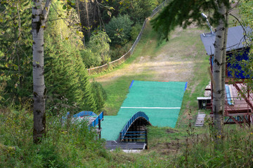 Ski jump. Artificial track Sport background Norway summer Vertical .