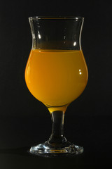 Orange drink in a cocktail glass