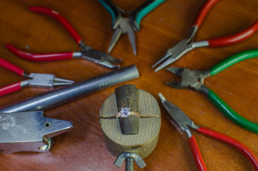 Obraz premium Desktop for craft jewellery making with professional tools.
