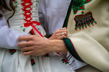 close up on the traditions of highlander clothing, male and female, love