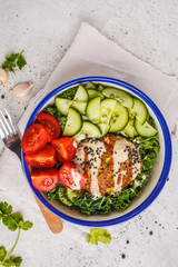 Vegan bean cutlet with vegetable salad and tahini dressing. Plant based diet concept.