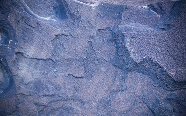 blue granite stone tiled background with vignette. geological, texture.