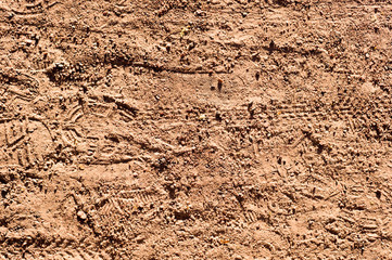 sandy path with cycle bike tire tracks. background, texture