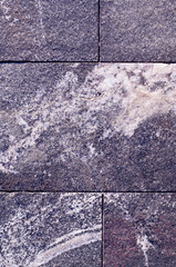 grey granite stone tiled background. architecture, texture.