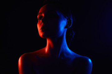 woman silhouette. Beautiful Girl in color bright lights