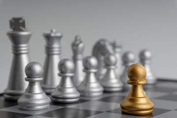 Chess pieces on the chess board with selective focus and crop fragment. Business and motivation concept. Copy space