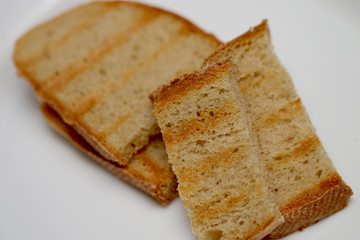 Bread of fried croutons on a white background