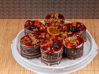 beautiful flower-shaped cake with dried fruit