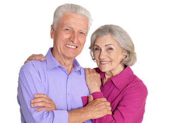 Portrait of happy senior couple on white background