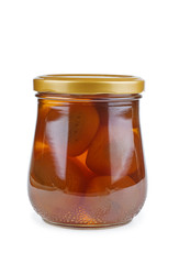 Homemade preserved apricots in glass jar isolated on white background